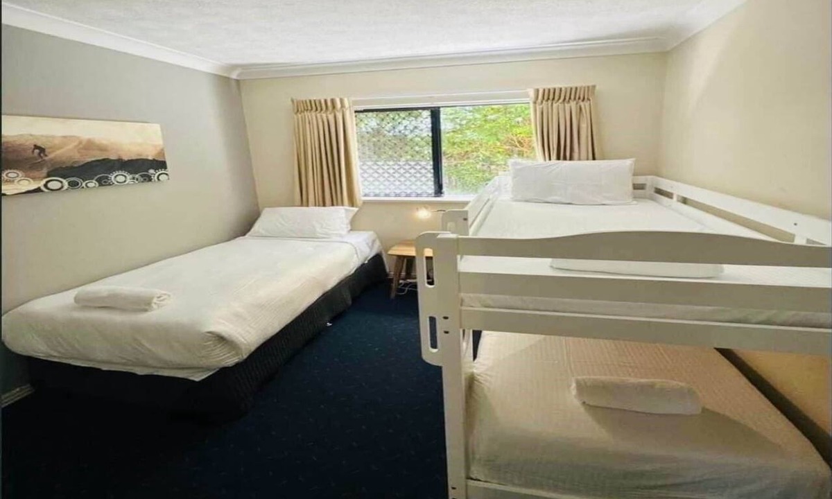 Mermaid Beach Apartment | 2-Bed Family Haven with Pools, BBQ & Playgrounds