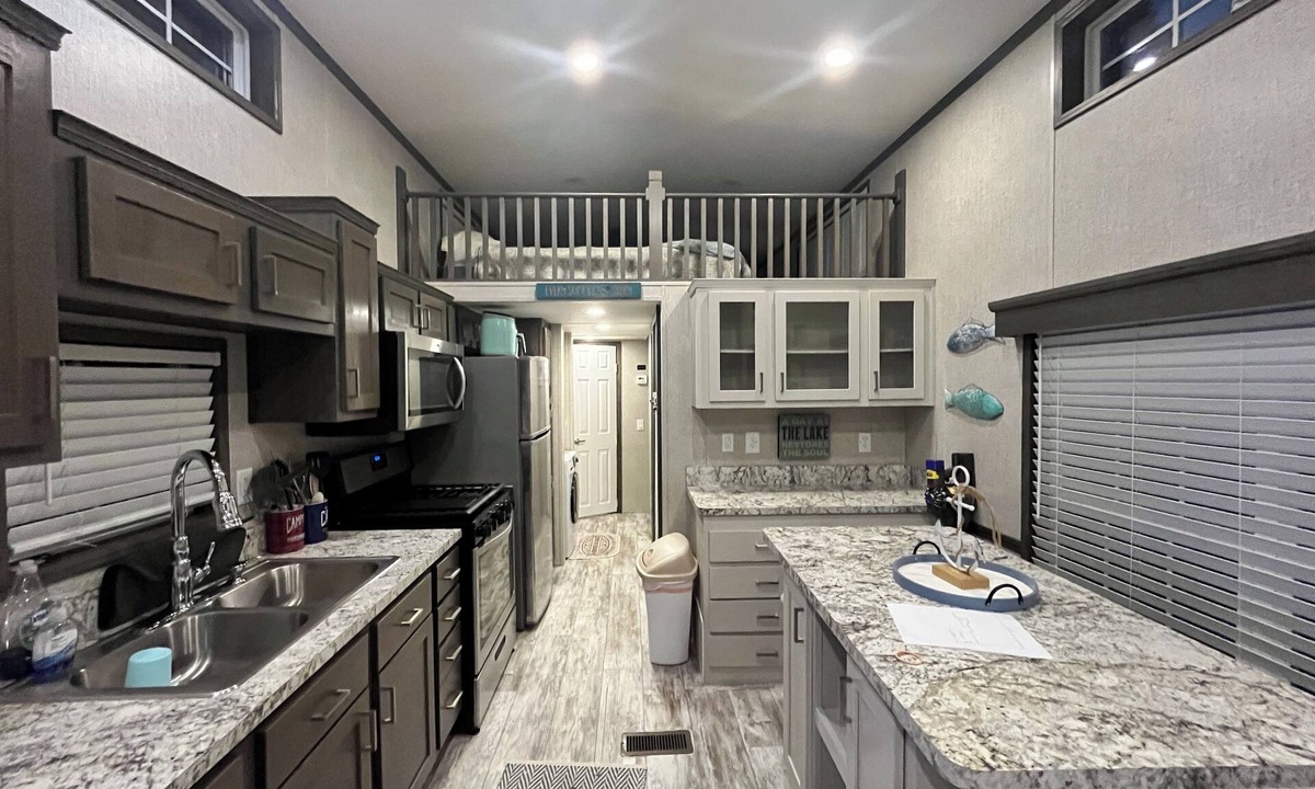 Speedwell Cabin | Cozy waterfront loft retreat with private dock, and lake access.