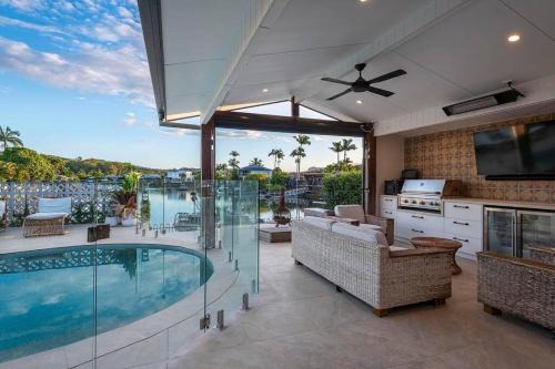 Currumbin Waters House | Waterfront 4BR Pool, BBQ & Currumbin Alley