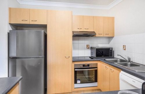 Mermaid Beach Apartment | 2-Bed Family Haven with Pools, BBQ & Playgrounds