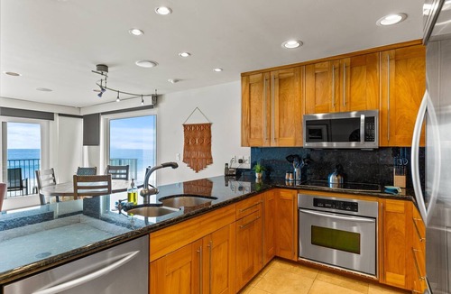 Carlsbad Village Condo | A Wave from it All Toes-in-the-sand