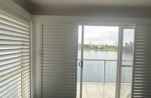 Coombabah House | Beautiful water front property with full kayak paddle board access, pvt pool