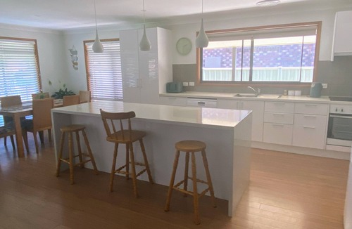 Yamba House | Coastal Palms Relaxing pet friendly accommodation with pool