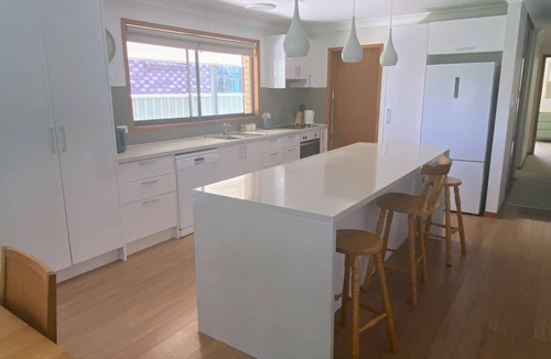 Yamba House | Coastal Palms Relaxing pet friendly accommodation with pool