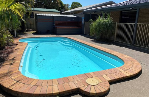 Yamba House | Coastal Palms Relaxing pet friendly accommodation with pool