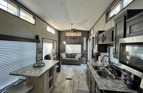 Speedwell Cabin | Cozy waterfront loft retreat with private dock, and lake access.