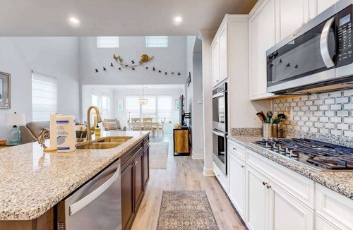 Bayside House | Dog-friendly resort townhouse w/shared sauna, fireplace, basketball/tennis court