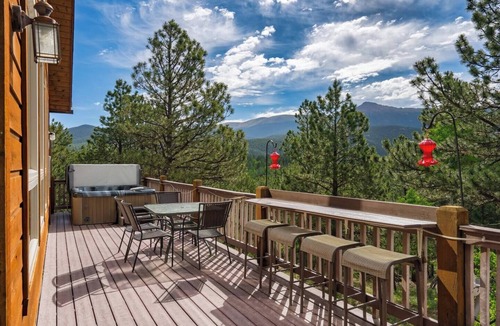 Rainbow Valley House | Family Cabin with looking up at back of Pikes Peak