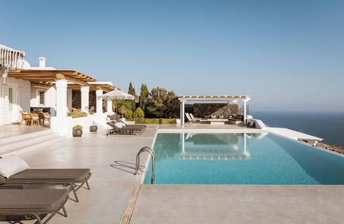 Imerovigli Villa | Luxury Villa in Imerovigli. 9 Bedrooms, accommodates 18 guests. Offers privacy.