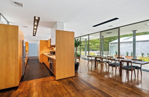 Springs House | Modern home sited on a lush wood acre, stunning pool, covered deck, outdoor.