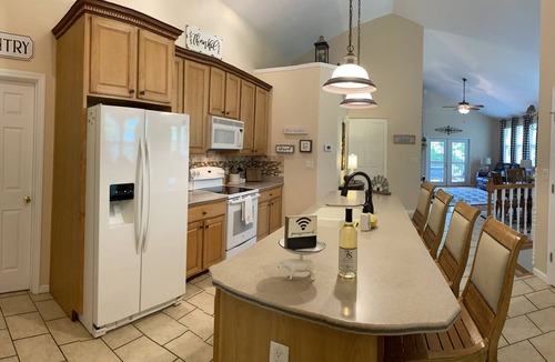 Camdenton House | Nestled by the 7th green, large deck areas. Movie theatre for inside or out.