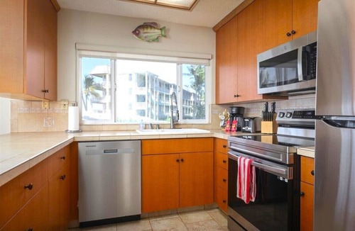 Historic Kailua Village Condo | Oceanfront 2nd Floor Corner Unit. Largest two bedroom that sleeps 5 in beds! D18