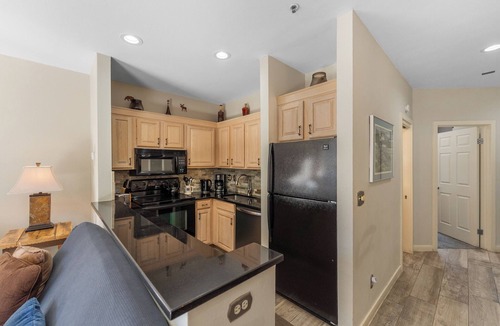 Lakeside Village Condo | Patio access to Keystone Lake & Gorgeous Views, Easy Access to Everything!