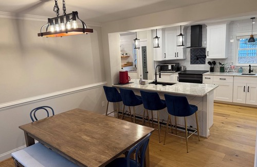 Gloucester Point House | Relax in our renovated get away that is only steps away from a secluded beach.