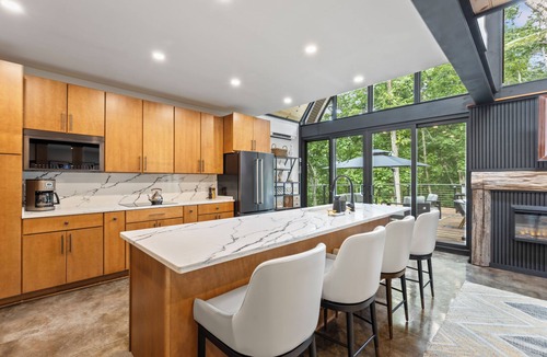 Blue Eye House | Secluded Modern Home on 9 Wooded Acres with Indoor Pickleball Court