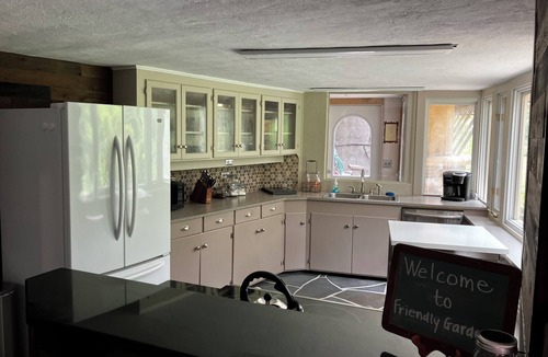 Emporium House | Secluded, organic modern 3-bedroom home in wooded setting.