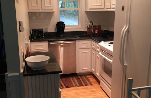 Lake Placid Club Cottage | Short walk to village.with private wooded setting. EV Charger in parking area.