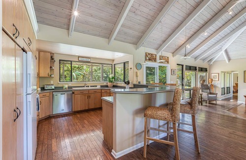 Princeville House | Walk to the beach in this lush, serene house with a private garden oasis