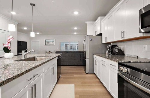 Caine Woods House | Z Estates | Balcony Beach View Townhome + Pool