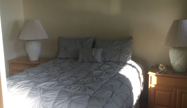 Bungalow 1 with large kitchen, outdoor private shower and 1/2 bath.
