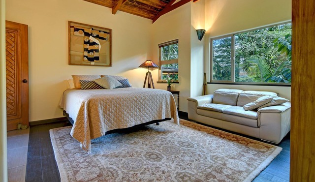 Escape to your private oasis perched on a cliff with a jungle view