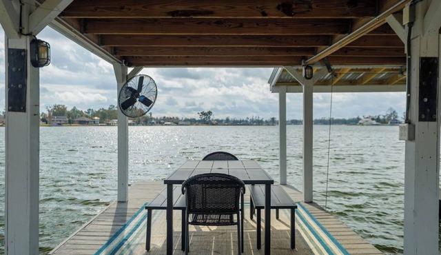 Lakefront Escape Large Dock, Swings, Screened Porch and Stunning Sunset Views