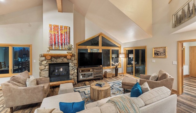 Private Wooded Setting with Open-Concept Layout and Updated Kitchen
