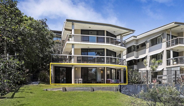 This ground floor apartment sits right at Cylinder Beach
